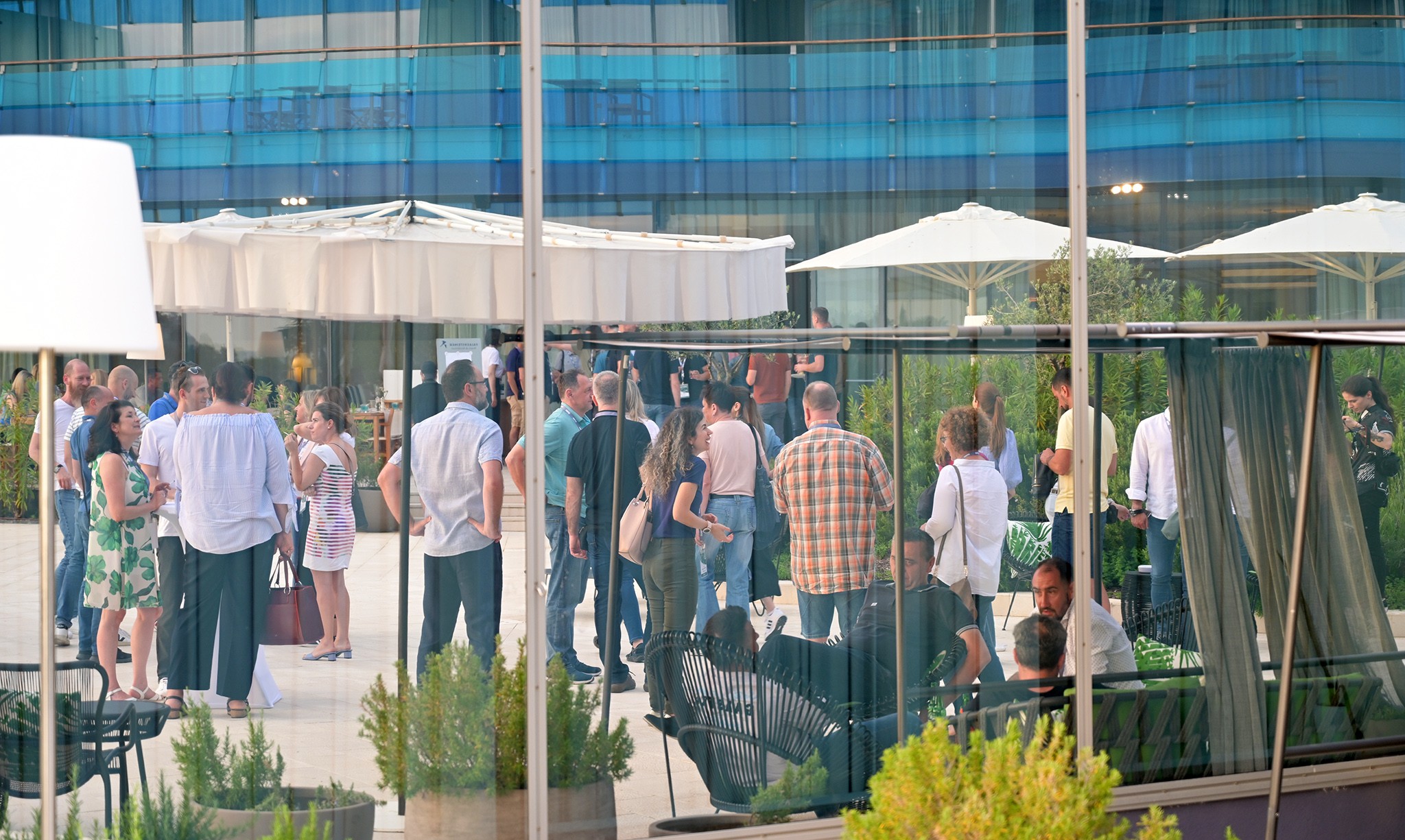 people casually hanging out at qed conference